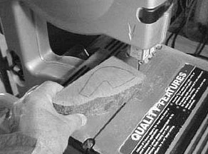 Step 2: The marked shape is then cut on a band saw.