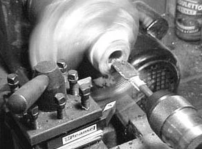 Step 3: Then I drill the smoke canal and tobacco chamber using a small lathe.